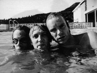The Police take a break from recording in AIr Studio's pool. 